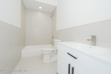 An exceptional extra large new construction 6/6 two-family semi - photo 16
