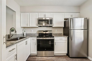 Welcome home to this beautifully renovated 2-bedroom, 1.5-bath - photo 17