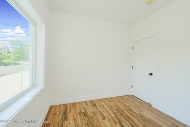 An exceptional extra large new construction 6/6 two-family semi - photo 17