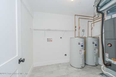 An exceptional extra large new construction 6/6 two-family semi - photo 29