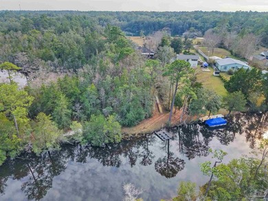 Situated on approximately 1.18 acres, this private Milton - photo 42