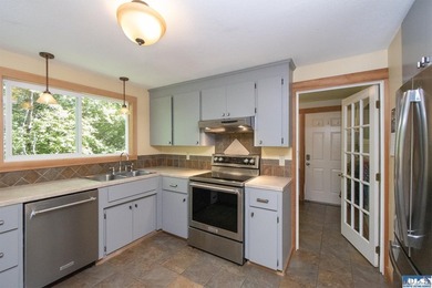 Tucked into a peaceful, creekside setting, this 3-bedroom - photo 11