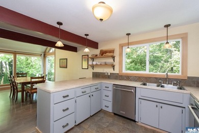 Tucked into a peaceful, creekside setting, this 3-bedroom - photo 14