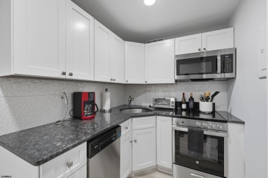 Exceptional shorefront living! This beautifully renovated condo