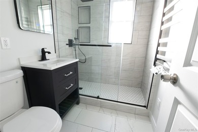 This colonial home has been extensively renovated and features a - photo 20