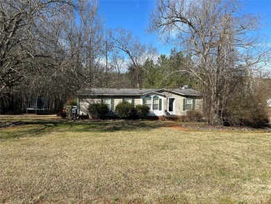 Take a look at this 3 bedroom 2 bath home close to downtown - Lake Home Sale Pending in Norwood, North Carolina