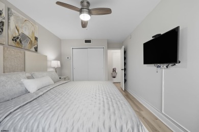 Exceptional shorefront living! This beautifully renovated condo