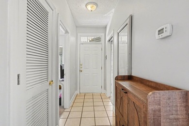 Welcome to 1141 Peace Pipe Place (Unit 201) in the gated - photo 4