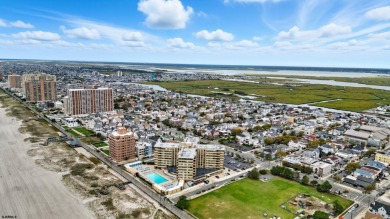 Exceptional shorefront living! This beautifully renovated condo