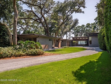 Discover this private modern riverfront estate on the Saint - photo 2