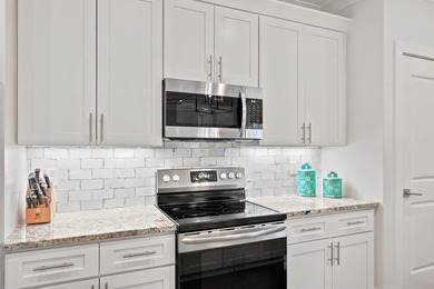 Rare main-level primary suite - while most 30A homes stack all - photo 7