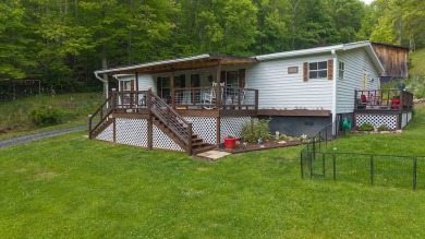 Lake Home For Sale in Lansing, North Carolina