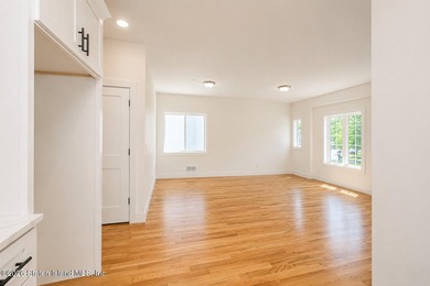 An exceptional new construction 6/6 two-family home offering 2 - photo 11
