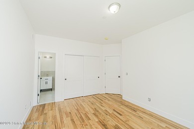 An exceptional new construction 6/6 two-family home offering 2 - photo 20