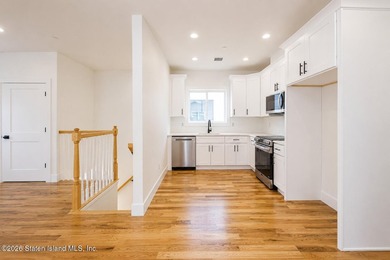 An exceptional new construction 6/6 two-family home offering 2 - photo 25
