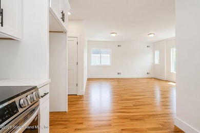 An exceptional new construction 6/6 two-family home offering 2 - photo 28