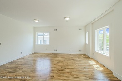 An exceptional new construction 6/6 two-family home offering 2 - photo 29