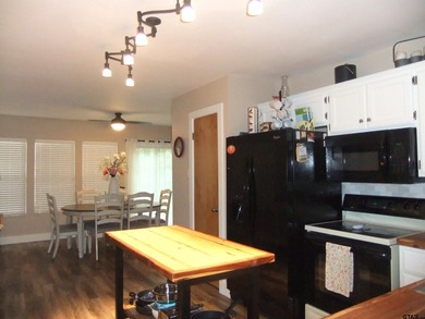 Totally and very tastefully remodeled this home is the - photo 5