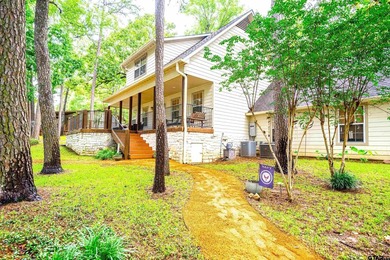 Located in the sought-after Tall Tree subdivision just across - photo 2