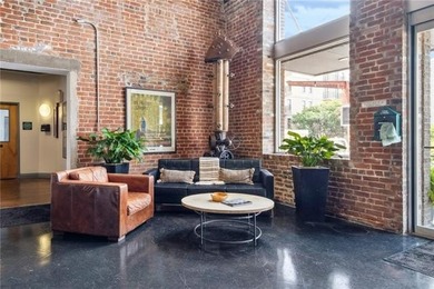 Charming, light-filled condo at the historic Cotton Mill comes