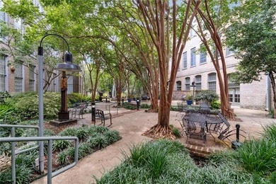 Charming, light-filled condo at the historic Cotton Mill comes