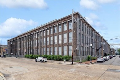 Charming, light-filled condo at the historic Cotton Mill comes