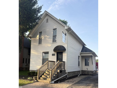 Located in the heart of downtown Romeo, this beautifully updated - photo 1