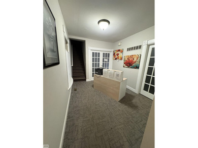 Located in the heart of downtown Romeo, this beautifully updated - photo 2