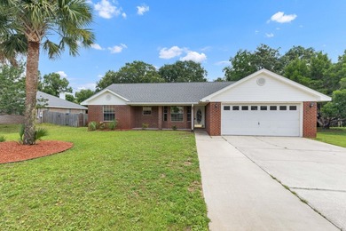 This charming brick home delivers a warm, functional layout - photo 1