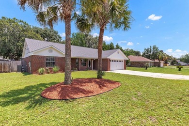 This charming brick home delivers a warm, functional layout - photo 2