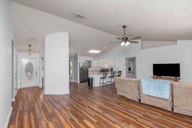This charming brick home delivers a warm, functional layout - photo 4