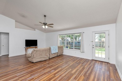 This charming brick home delivers a warm, functional layout - photo 6