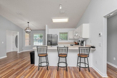 This charming brick home delivers a warm, functional layout - photo 9