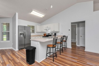 This charming brick home delivers a warm, functional layout - photo 10