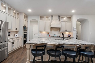 Luxurious one-story home located on a quiet cul-de-sac in a - photo 11