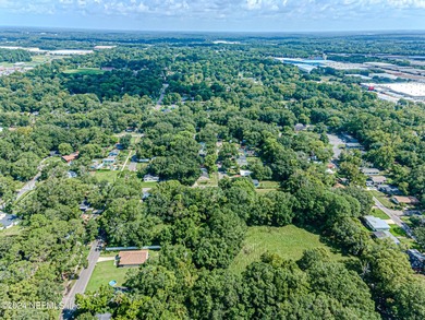 This 3.5+ acre partially cleared parcel on Detroit Street offers - photo 13