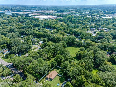 This 3.5+ acre partially cleared parcel on Detroit Street offers - photo 14