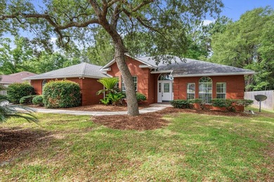 Located in the highly sought-after community of Niceville, this - photo 1