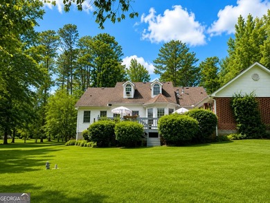 Welcome home to this beautiful 4-bedroom, 3-bath retreat nestled - photo 6
