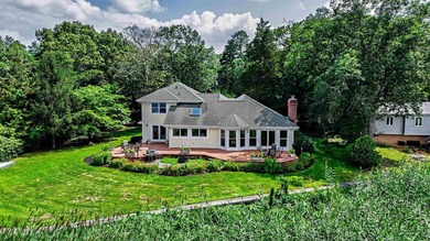 Experience luxurious riverfront living in this fully renovated - photo 1