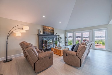 Experience luxurious riverfront living in this fully renovated - photo 8