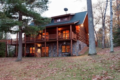 Luxury Log Home on Catfish Lake! Welcome home to this 4,000 sq - Lake Home For Sale in Eagle River, Wisconsin