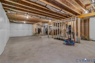Welcome to 25 Essie Court - a 2022-built ranch-style home in the - photo 11