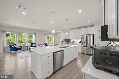 Welcome to this exceptional, nearly new condominium in the - photo 12