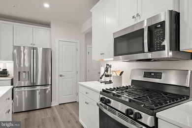 Welcome to this exceptional, nearly new condominium in the - photo 13
