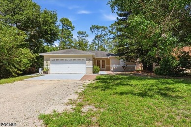 This move-in ready 3-bed + Den, 2-bath home sits on over 1 acre - photo 4