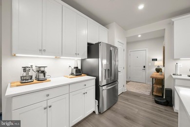 Welcome to this exceptional, nearly new condominium in the - photo 14