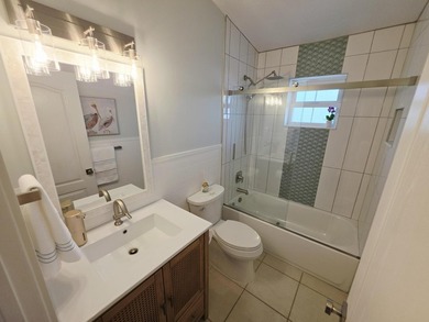 Elevated Coastal Living in Breezeswept Beach Estates. Skip the - photo 19