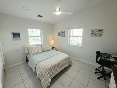 Elevated Coastal Living in Breezeswept Beach Estates. Skip the - photo 20