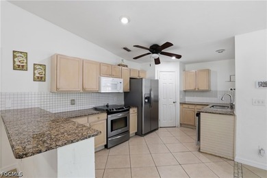 This move-in ready 3-bed + Den, 2-bath home sits on over 1 acre - photo 10